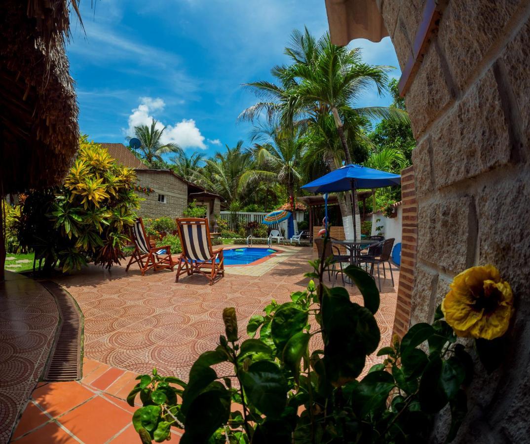 Отель Portoazul Casa De Playa Пуэрто-Коломбия Экстерьер фото